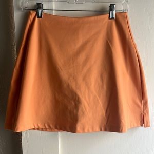 Girlfriend Collective skort (horizon orange)
